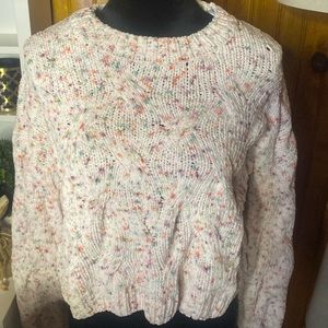 SO SOFT! Light pink cropped knit sweater with multicolor print.